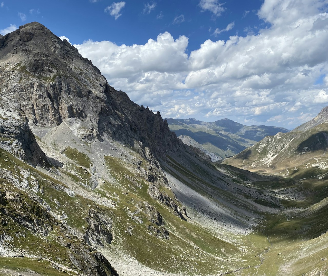 green and gray mountains under blue sky during daytime